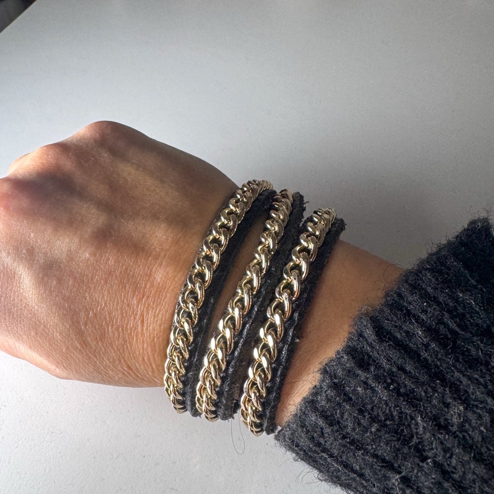 Black and gold wrap bracelet with 2 different snaps to adjust size